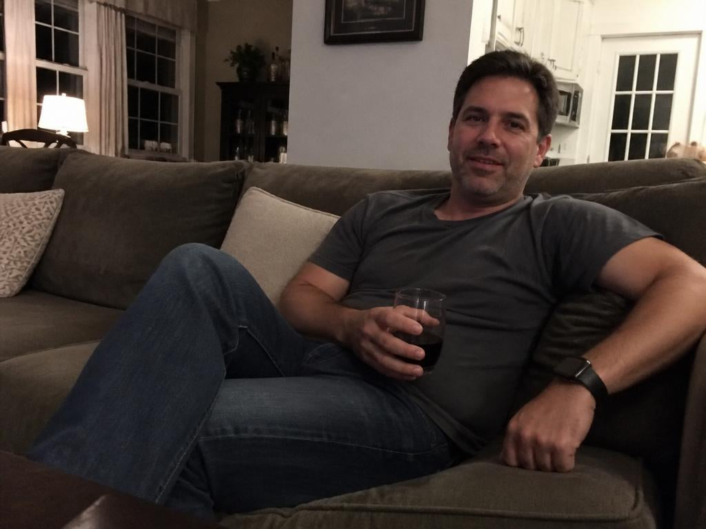 A man relaxing calmly at home