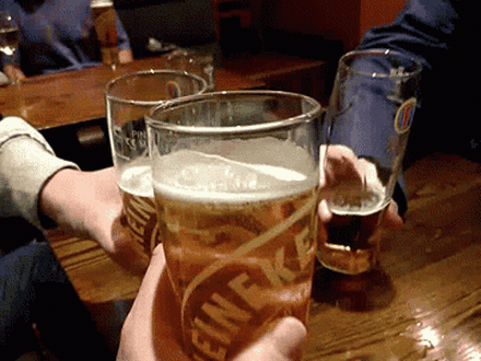 Friends toasting with beers