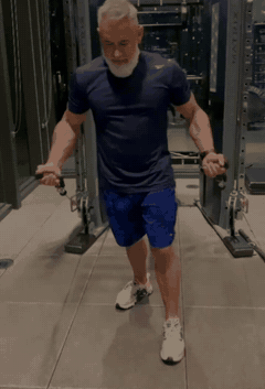 A vital, energetic man training at the gym